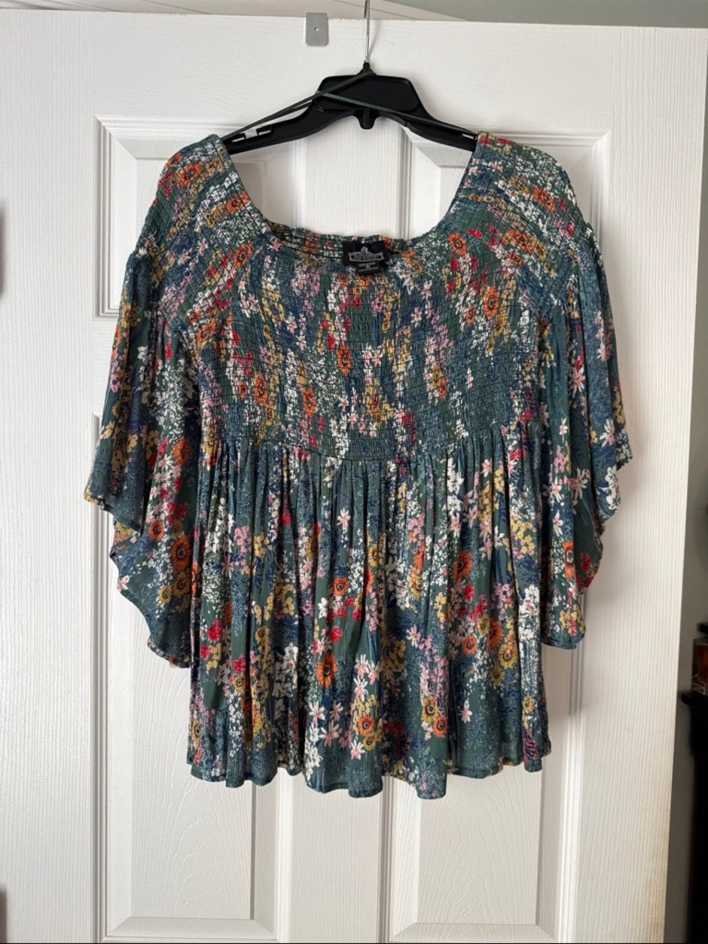 Angie Teal Floral Smocked Peasant Blouse